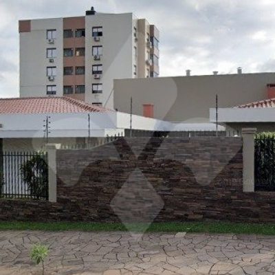 Casa com 300m², 3 dormitórios, 1 suíte, 6 vagas no bairro Cristo Redentor em Porto Alegre para Comprar