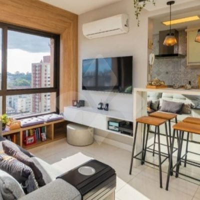 Apartamento com 65m², 2 dormitórios, 1 suíte, 1 vaga no bairro Passo da Areia em Porto Alegre para Comprar